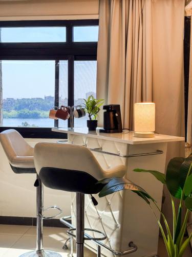 Elegant 2BR Duplex in Maadi with Panoramic Nile Views