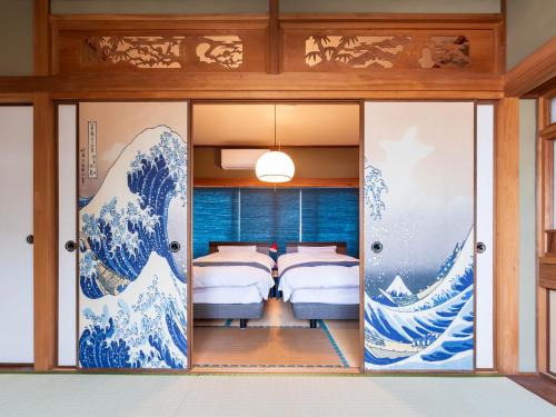 Giường trong phòng chung tại tazuraya-seto-一棟貸切-無料駐車場