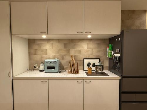 Kuchyň nebo kuchyňský kout v ubytování 金春in KONPAL