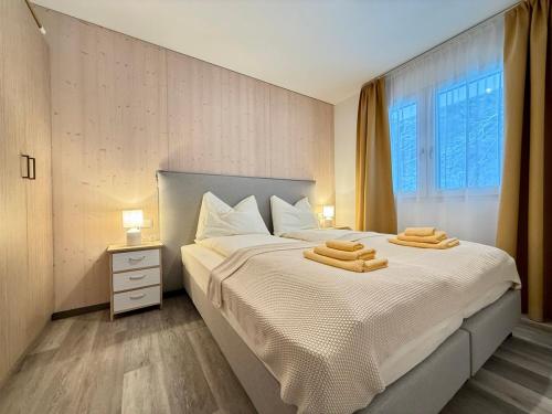 Postel nebo postele na pokoji v ubytování Treehouse - Alpinlake Apartments