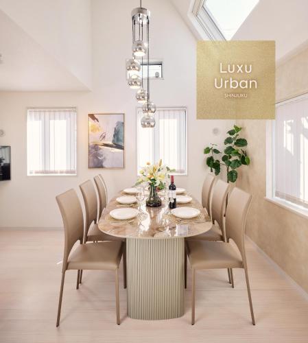 a dining room with a table and chairs at LUXU Urban Shinjuku - 4min to Shinjuku, 10min to Shibuya in Tokyo