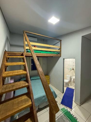 En eller flere køjesenge i et værelse på Casa ampla com vista pra mata