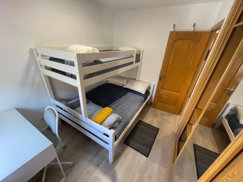 an overhead view of a bunk bed in a room at Piso en Calle Albares De La Ribera in Madrid