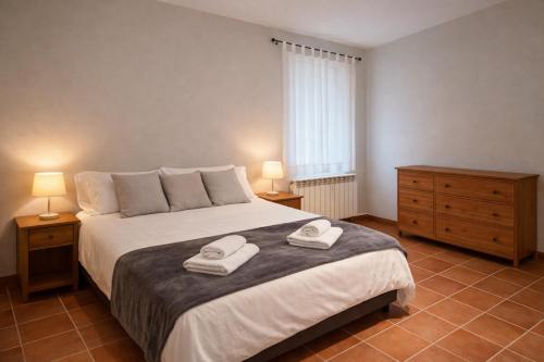 Postel nebo postele na pokoji v ubytování Can Ricart