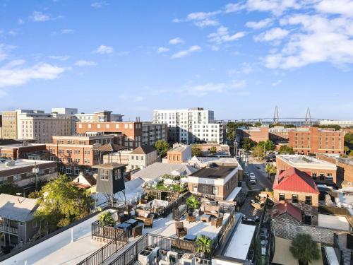 an aerial view of a city with buildings at Fire Tower Downtown Gem 1BR with Balcony & Views in Charleston