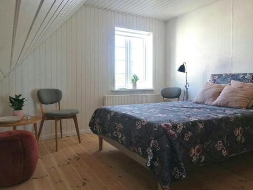 Ein Bett oder Betten in einem Zimmer der Unterkunft Nature Gem Near Haderslev With 160-Year-Old Beech