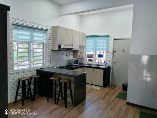 Køkken eller tekøkken på Malay Homestay di Meru, Klang