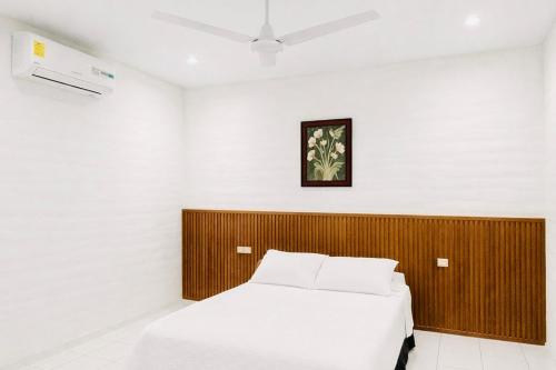 Postel nebo postele na pokoji v ubytování Hotel Raíces Ataco