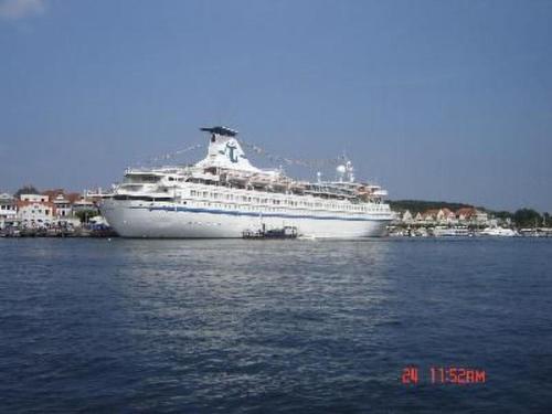 a large cruise ship sitting in the water at Apartment in Dassow by Interhome in Feldhusen