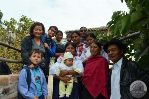 a group of people posing for a picture at Casa Hotel Loma Wasi en Cotacachi in Cotacachi