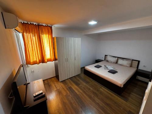 En eller flere senge i et værelse på Dunav Apart