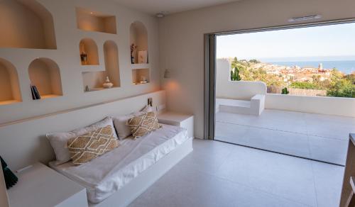 Postel nebo postele na pokoji v ubytování Can Jeannette Vue Mer & Montagne - Lodge 2