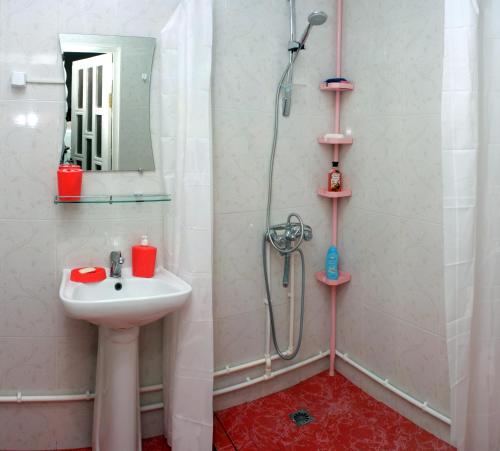Ванная комната в Мариам Апартаменты