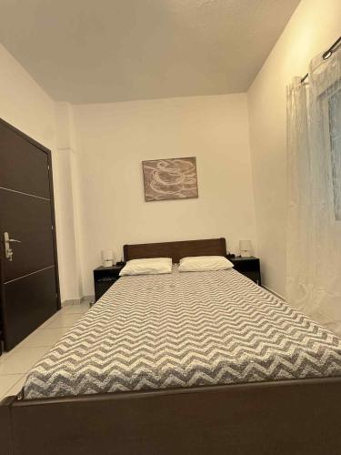 Llit o llits en una habitació de Olympus Embrace