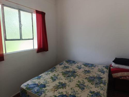 En eller flere senge i et værelse på Las Vertientes