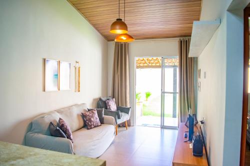 Et opholdsområde på Casa Lima com Piscina e Praia