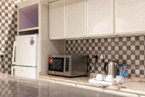 Køkken eller tekøkken på شقق اماليا للشقق المخدومة