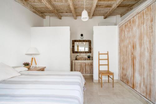 En eller flere senge i et værelse på Apartamentos Castillo Quince