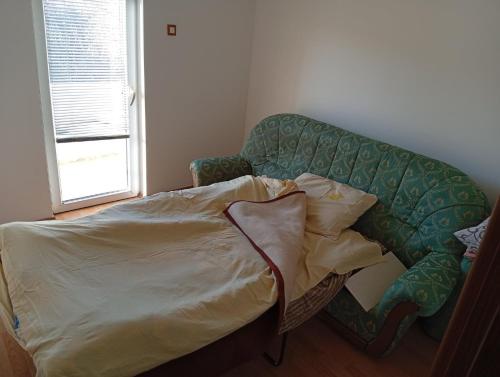 En eller flere senge i et værelse på Vlado