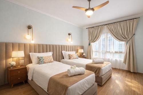 En eller flere senge i et værelse på Appartement Luxe Marina Agadir