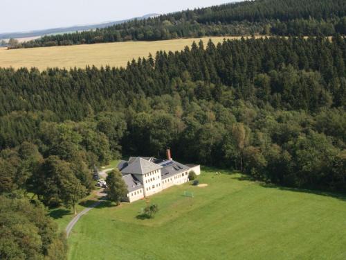 an aerial view of a large house in a field at Apartment Mortelgrund by Interhome in Sayda