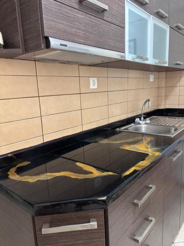 Nhà bếp/bếp nhỏ tại Kaitiapartments