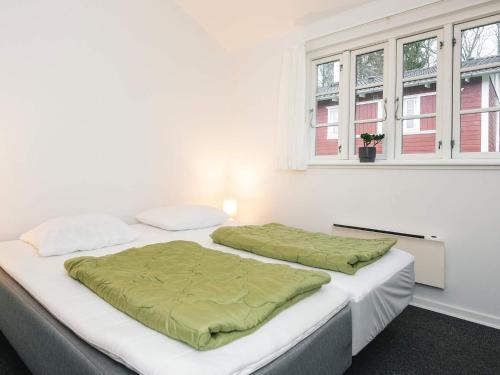 Giường trong phòng chung tại 8 person holiday home in Aabenraa-By Traum