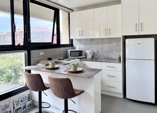 Nhà bếp/bếp nhỏ tại Potts Point Cozy Studio Near Parks Water