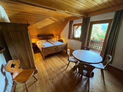 En eller flere senge i et værelse på Landhaus Finkenhof