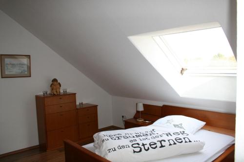Ένα ή περισσότερα κρεβάτια σε δωμάτιο στο Gästezimmer Hausäckerweg