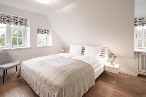 En eller flere senge i et værelse på La Vela