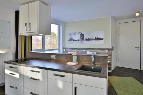 Køkken eller tekøkken på Duhner Strandhus, S202