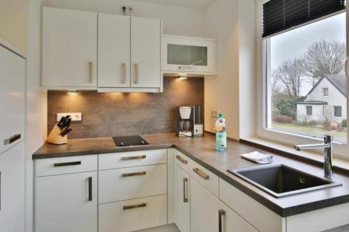 Køkken eller tekøkken på Duhner Strandhus, S101