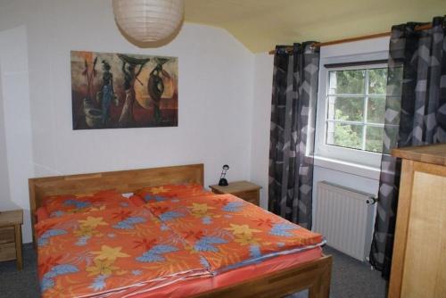 Giường trong phòng chung tại Am Hegehof - ABC181