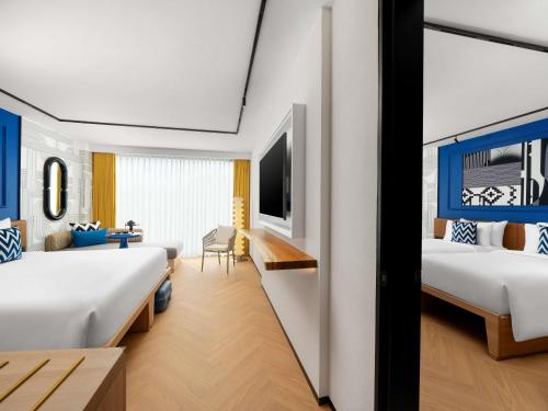 En eller flere senge i et værelse på TRIBE Phuket Patong by Accor
