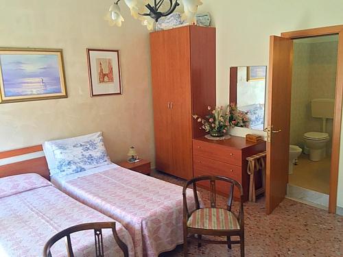 Postel nebo postele na pokoji v ubytování B&B Gelone