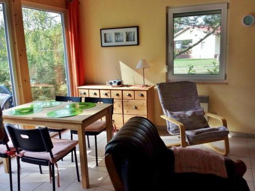 Et opholdsområde på "Ferien Nord-Nordost" Wooster Teerofen "Am Walde" Ferienhaus Komfort