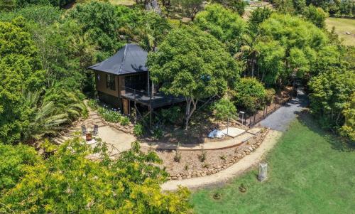 an overhead view of a house in a garden at Green Buddha in Milton