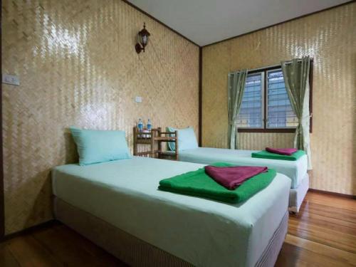 Postel nebo postele na pokoji v ubytování VN Guesthouse