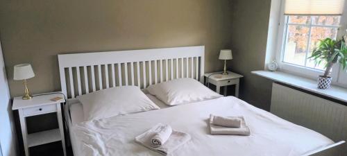 Postel nebo postele na pokoji v ubytování Idyllische Lage im Süden Erfurts