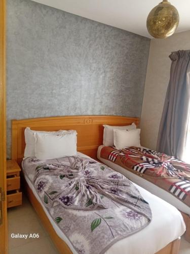 Llit o llits en una habitació de Appart-Hotel SOFINES