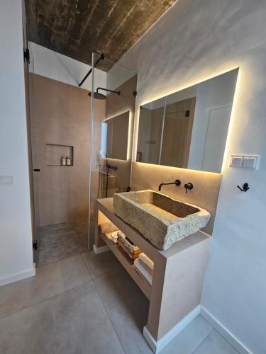 Et badeværelse på Sunset Guesthouse - Hiking & Beach