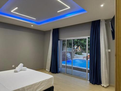 En eller flere senge i et værelse på Comfort Inn Guest House