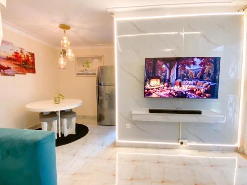 Et tv og/eller underholdning på Beautiful Spaces Haven