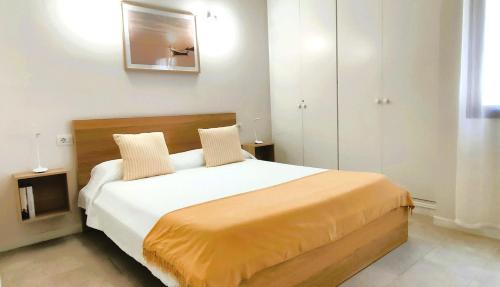 En eller flere senge i et værelse på Casa Nature