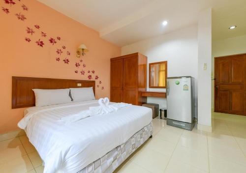 Postel nebo postele na pokoji v ubytování Sun and beach hotel