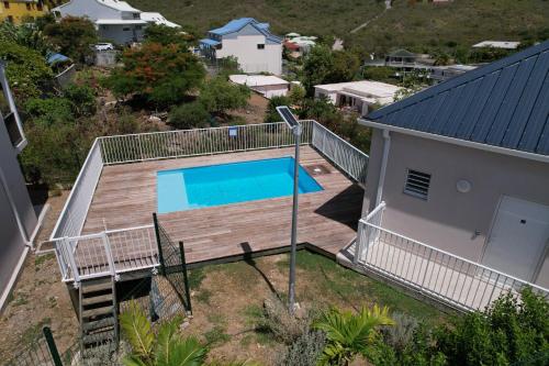 Swimmingpoolen hos eller tæt på Vue mer Ilet Pinel - Appartement 4p 1ch