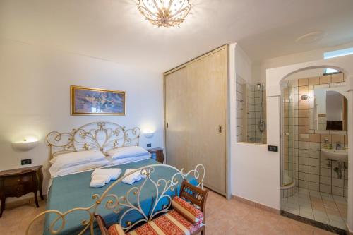 Giường trong phòng chung tại Casa Il Riccio