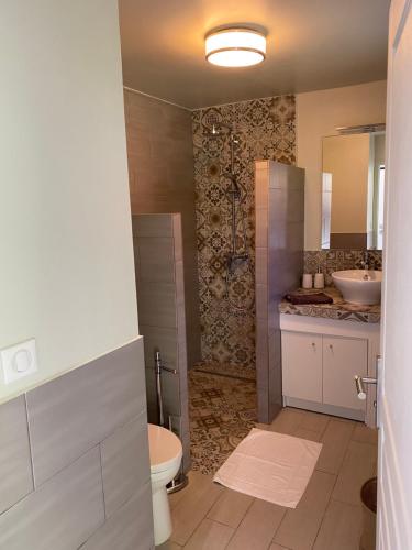 Koupelna v ubytování Appart Flamboyant 1006