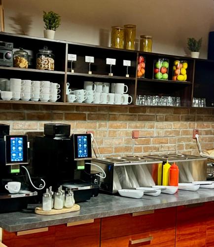 Een keuken of kitchenette bij Hotel Astra